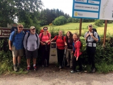 The halfway marker shows 100 km to Santiago