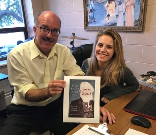 ﻿Dr. Chris Momany with student Sydney Raymo in the Adrian College Chaplain’s Office.