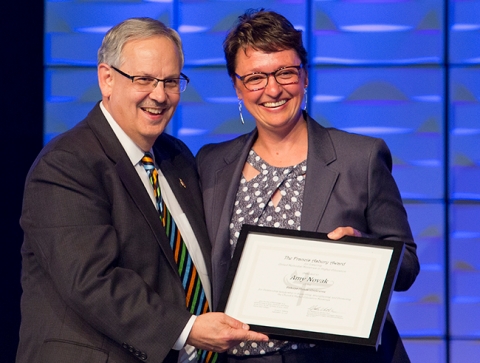 Bishop Bruce Ough presents the Francis Asbury Award to Amy Novak at the Dakotas Annual Conference. Photo credit: Joni Rasmussen