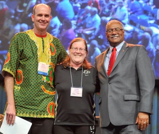 Bishop Julius Trimble presents the Francis Asbury Award to the Wesley Foundation at Purdue University during the Indiana Annual Conference.