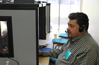 A man Translating the meeting.