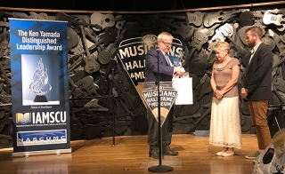 Greg Bergquist, associate general secretary at GBHEM, presented Ted Brown’s wife, Cheryl, and son, Tyler, with the Ken Yamada Distinguished Leadership Award Flame of Excellence statue as well as a personal gift from Ken Yamada, for whom the award is named.