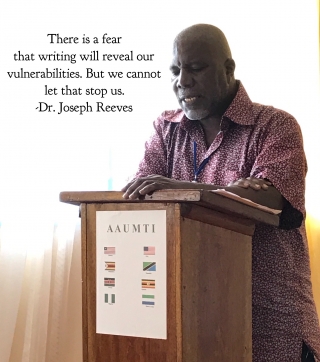 Dr. Joseph Reeves, director of advising and counseling assistant professor, Philosophy and Religion at the University of Liberia, encourages participants to draw upon their own personal stories in their writing at an AAUMTI writers workshop this summer