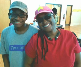 (L) Eighth grader Trey, a scholar at the 2017 Freedom School  at Gordon Memorial United Methodist Church, learned lessons in cultural  pride, confronting bullying, and being his best self, says his mom (R).