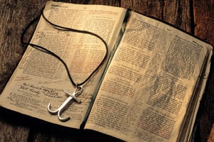 Bible with anchor cross