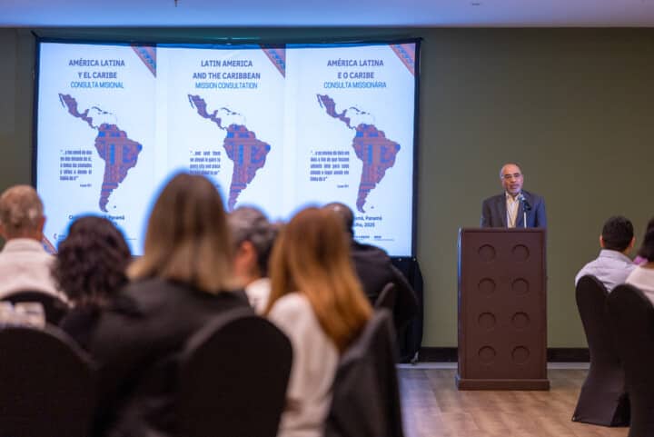 General Secretary Roland Fernandes delivers opening remarks to the gathered attendees. Photo: Adam Bowers 