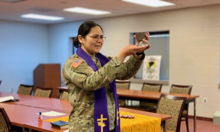 Military chaplain serving communion 2 Military chaplain serving communion 2