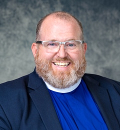 2-19-26-Eric-DoolittelELD-AU-headshot The Rev. Eric Doolittle